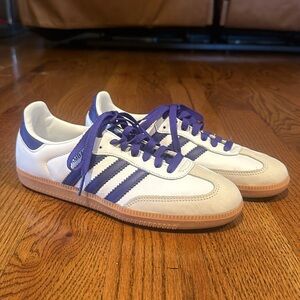 white and purple adidas sambas